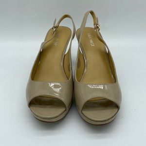 New Nine West 3 inch kitten heel sling back peep toe heels in tan. Size 9